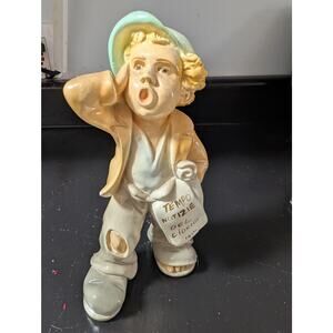 Italian paperboy figurine